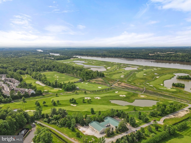 aerial view of property's location featuring a nearby body of water and a local golf course