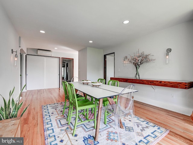 2025 Skyline Rd, Towson, MD 21204 - dining space with a wall mounted AC, wood finished floors, recessed lighting, and baseboards