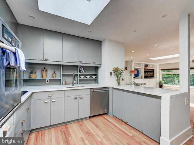 2025 Skyline Rd, Towson, MD 21204 - kitchen featuring stainless steel appliances, a sink, gray cabinetry, open shelves, and recessed lighting