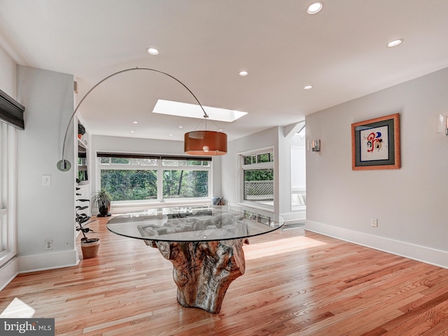 2025 Skyline Rd, Towson, MD 21204 - rec room with light wood-style floors, recessed lighting, a skylight, and baseboards