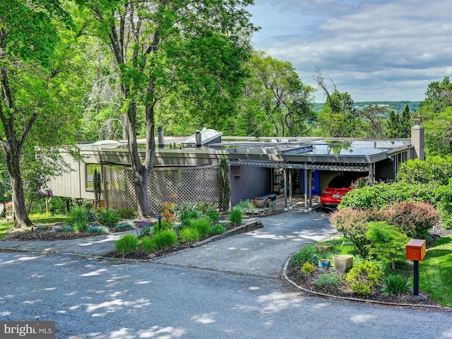 2025 Skyline Rd, Towson, MD 21204 - view of front of house featuring driveway and an attached carport