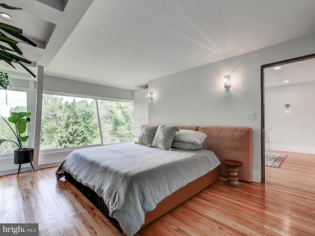 2025 Skyline Rd, Towson, MD 21204 - bedroom featuring multiple windows, light wood-style floors, recessed lighting, and baseboards