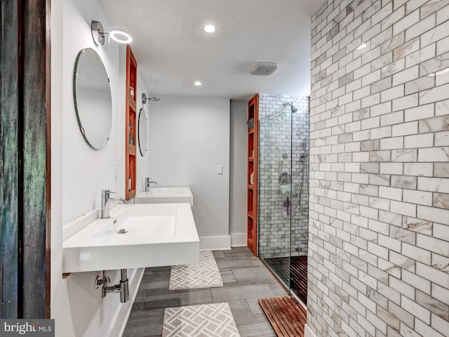2025 Skyline Rd, Towson, MD 21204 - bathroom featuring a shower stall, recessed lighting, and double sink