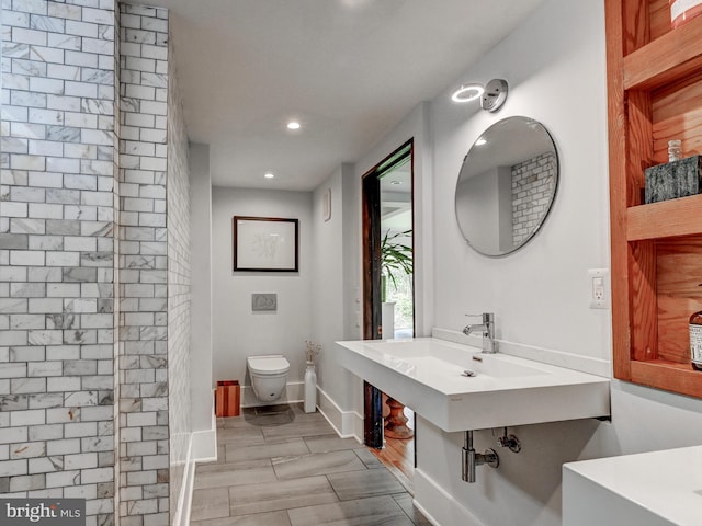 2025 Skyline Rd, Towson, MD 21204 - bathroom with toilet, baseboards, and recessed lighting