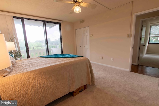 6301 Stevenson Ave Unit 602, Alexandria, VA 22304 - bedroom with carpet floors, baseboards, a ceiling fan, and a closet