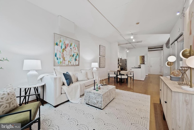 2020 12th St NW Unit 217, Washington, DC 20009 - living room featuring wood finished floors