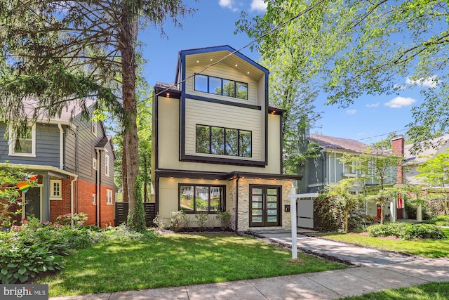 5706 Nevada Ave NW, Washington, DC 20015 - contemporary home featuring french doors and a front yard