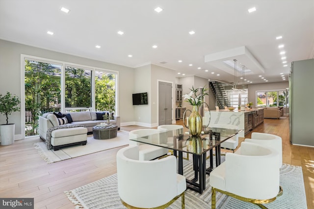 5706 Nevada Ave NW, Washington, DC 20015 - dining area featuring healthy amount of natural light, light wood-style floors, baseboards, crown molding, and recessed lighting