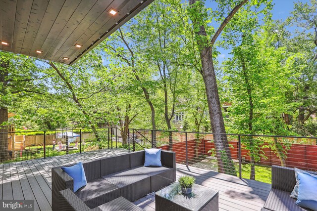 5706 Nevada Ave NW, Washington, DC 20015 - wooden terrace featuring an outdoor living space, a fenced backyard, and view of scattered trees