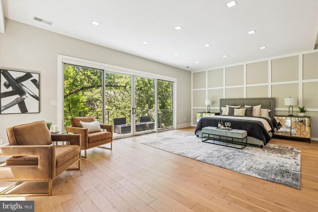 5706 Nevada Ave NW, Washington, DC 20015 - bedroom with access to outside and light wood finished floors
