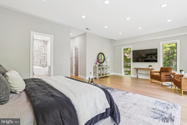 5706 Nevada Ave NW, Washington, DC 20015 - bedroom with light wood-type flooring, recessed lighting, and baseboards