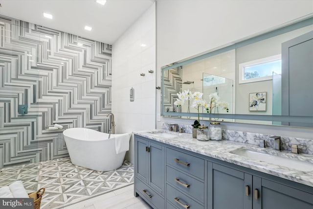 5706 Nevada Ave NW, Washington, DC 20015 - full bathroom with a stall shower, a soaking tub, double vanity, tile walls, and tile patterned floors