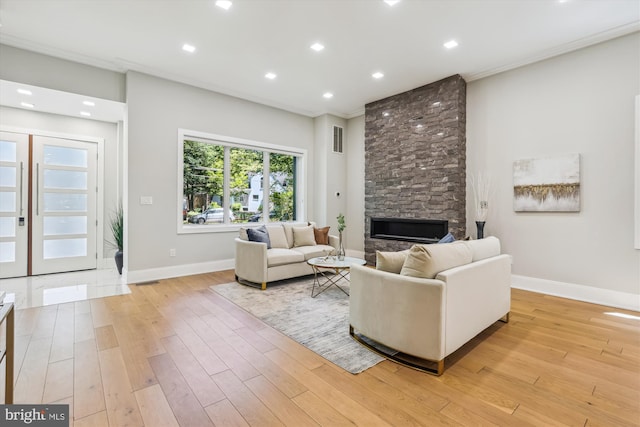 5706 Nevada Ave NW, Washington, DC 20015 - living room with a fireplace, baseboards, light wood-type flooring, and recessed lighting