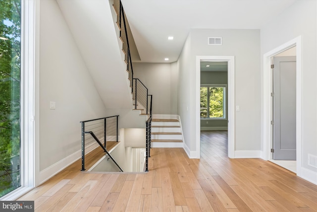 5706 Nevada Ave NW, Washington, DC 20015 - staircase featuring wood-type flooring, baseboards, and recessed lighting