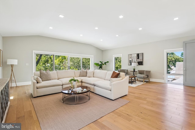 5706 Nevada Ave NW, Washington, DC 20015 - living room with plenty of natural light, lofted ceiling, light wood-type flooring, recessed lighting, and baseboards