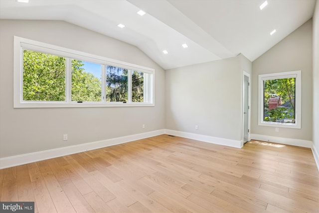 5706 Nevada Ave NW, Washington, DC 20015 - spare room featuring lofted ceiling, plenty of natural light, light wood-style floors, baseboards, and recessed lighting