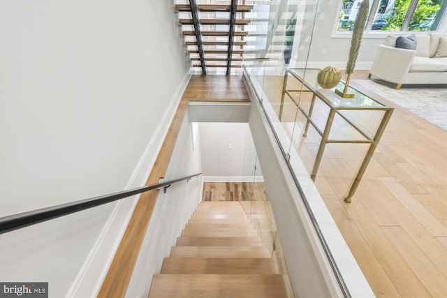 5706 Nevada Ave NW, Washington, DC 20015 - stairs with wood finished floors and baseboards