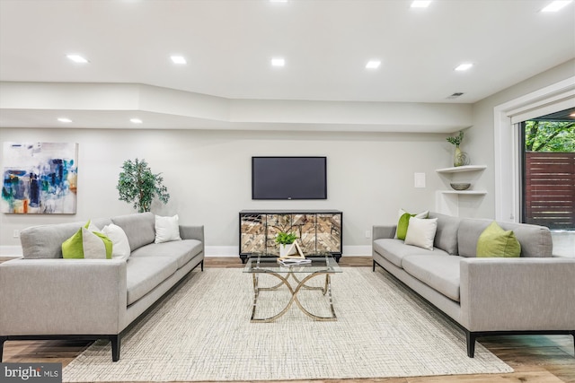 5706 Nevada Ave NW, Washington, DC 20015 - living room featuring wood finished floors, recessed lighting, and baseboards