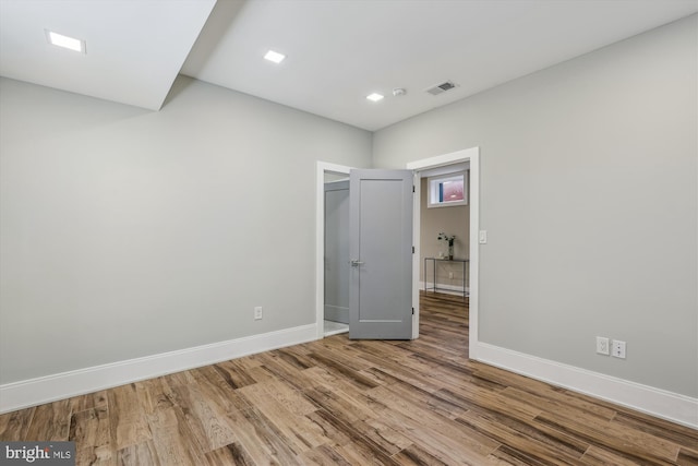 5706 Nevada Ave NW, Washington, DC 20015 - unfurnished bedroom with baseboards and wood finished floors