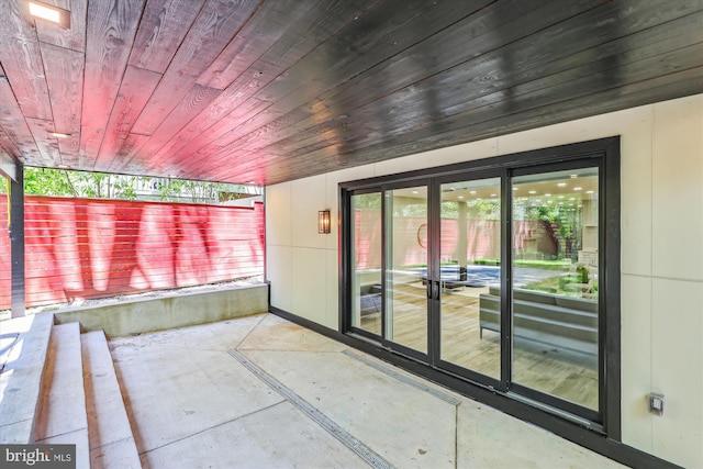 5706 Nevada Ave NW, Washington, DC 20015 - unfurnished sunroom featuring french doors