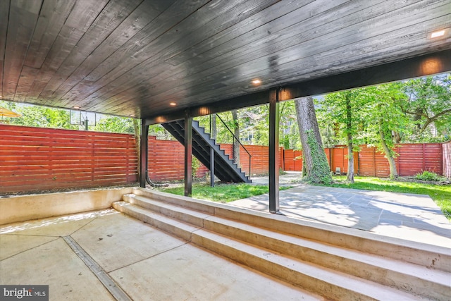 5706 Nevada Ave NW, Washington, DC 20015 - view of patio featuring stairway and a fenced backyard