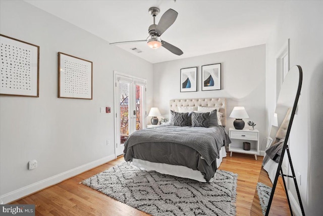 1407 15th St NW Unit 4, Washington, DC 20005 - bedroom with access to exterior, baseboards, light wood finished floors, and a ceiling fan