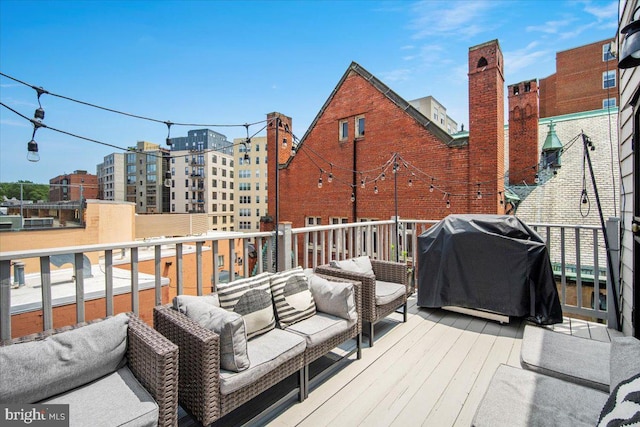 1407 15th St NW Unit 4, Washington, DC 20005 - wooden deck with a grill and an outdoor living space