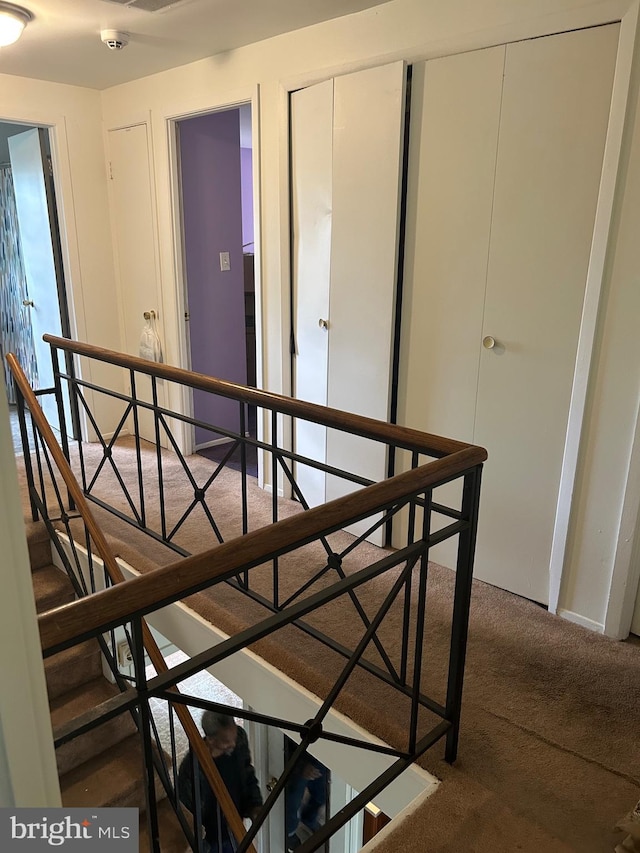 59 Emerald Ln, Willingboro, NJ 08046 - staircase featuring carpet floors