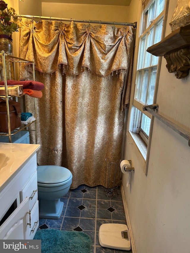 59 Emerald Ln, Willingboro, NJ 08046 - full bathroom with toilet, tile patterned floors, vanity, and curtained shower