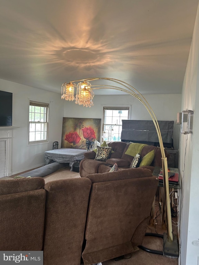 59 Emerald Ln, Willingboro, NJ 08046 - living area featuring a chandelier and carpet