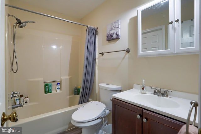 full bath with toilet, shower / bathtub combination with curtain, and vanity