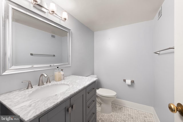 4620 N Park Ave N Unit 1206E, Chevy Chase, MD 20815 - bathroom with vanity, toilet, tile patterned floors, and baseboards