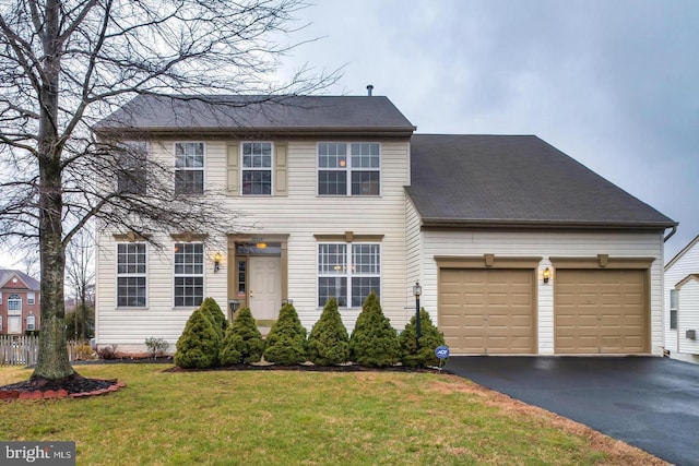 10578 Talisa Ln, Manassas, VA 20112 - view of front facade featuring driveway, a garage, and a front yard