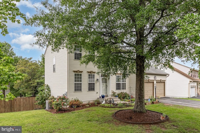 10578 Talisa Ln, Manassas, VA 20112 - obstructed view of property featuring driveway and an attached garage