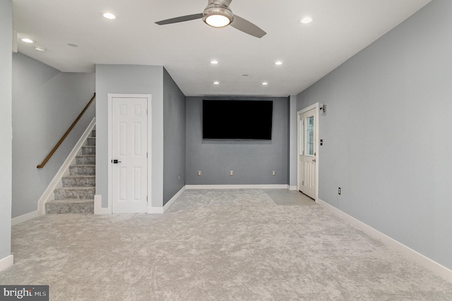 10578 Talisa Ln, Manassas, VA 20112 - unfurnished living room with carpet flooring, stairs, recessed lighting, a ceiling fan, and baseboards