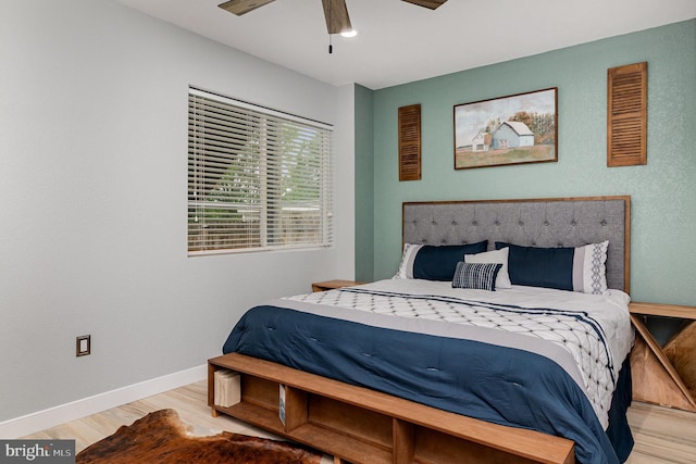 10578 Talisa Ln, Manassas, VA 20112 - bedroom featuring wood finished floors, a ceiling fan, and baseboards