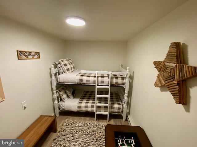 bedroom featuring wood finished floors