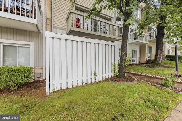 7233 Jillspring Ct Unit 18C, Springfield, VA 22152 - view of home's exterior featuring a lawn and a balcony