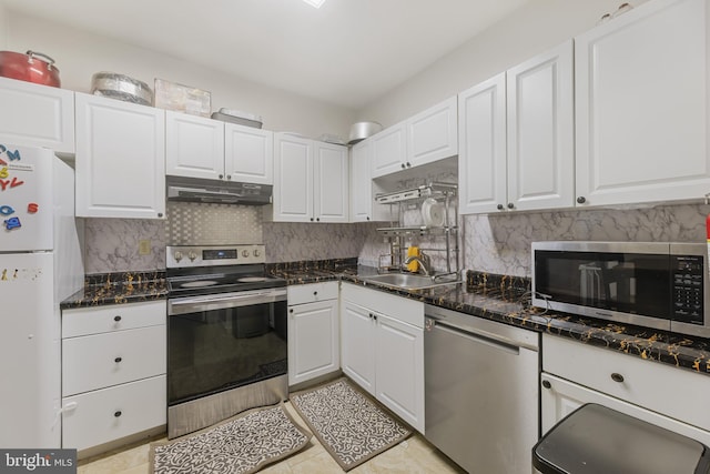 7233 Jillspring Ct Unit 18C, Springfield, VA 22152 - kitchen with stainless steel appliances, under cabinet range hood, white cabinetry, and backsplash