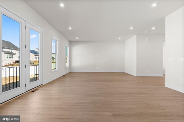 112 Heyford Dr, Stephenson, VA 22656 - spare room featuring recessed lighting, light wood-type flooring, and baseboards