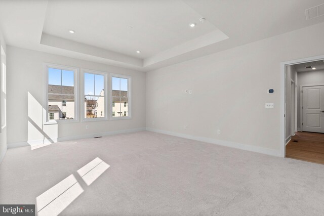 112 Heyford Dr, Stephenson, VA 22656 - empty room featuring a raised ceiling, carpet, baseboards, and recessed lighting