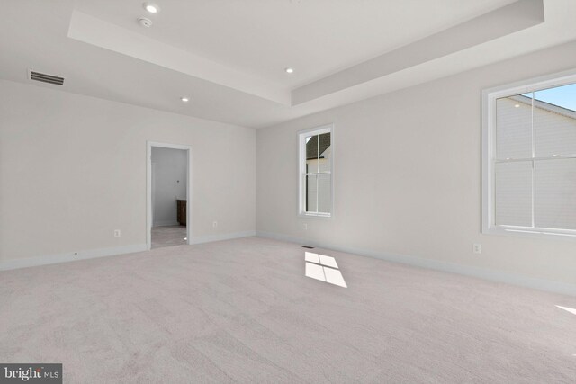 112 Heyford Dr, Stephenson, VA 22656 - empty room featuring a raised ceiling, baseboards, recessed lighting, light colored carpet, and a smoke detector