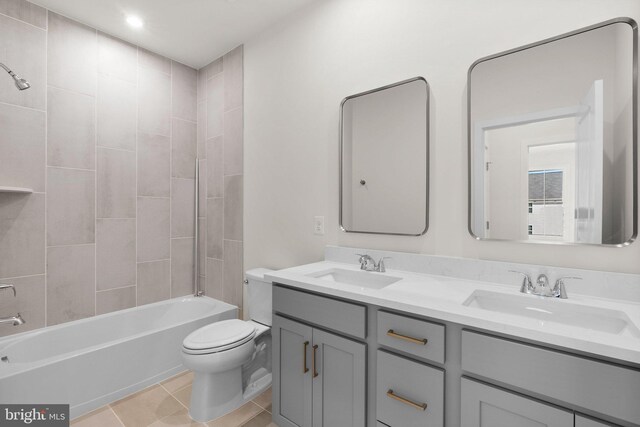 112 Heyford Dr, Stephenson, VA 22656 - bathroom with toilet, double vanity, tub / shower combination, and tile patterned flooring