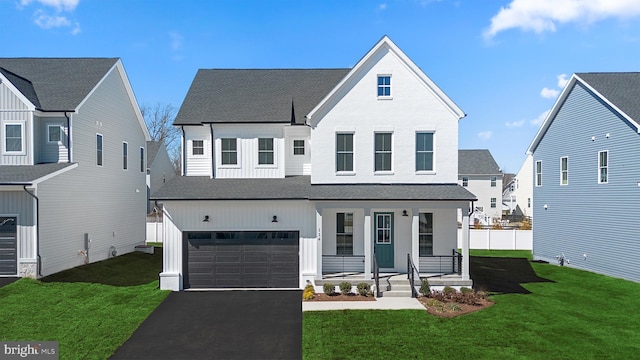 114 Heyford Dr, Stephenson, VA 22656 - modern farmhouse featuring a porch, a shingled roof, a garage, driveway, and board and batten siding