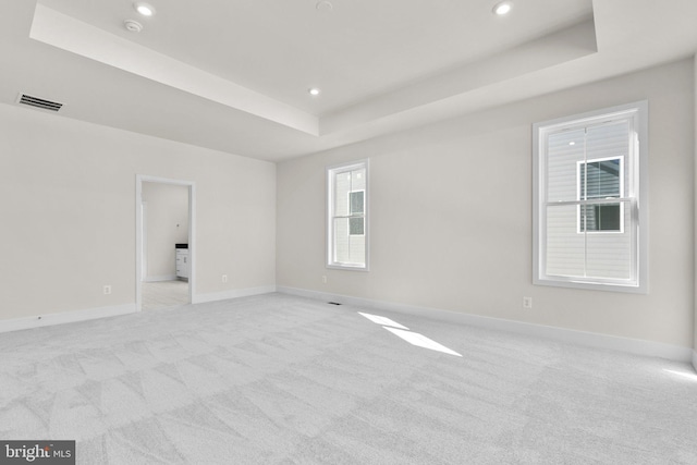114 Heyford Dr, Stephenson, VA 22656 - empty room featuring a tray ceiling, light carpet, baseboards, recessed lighting, and a smoke detector