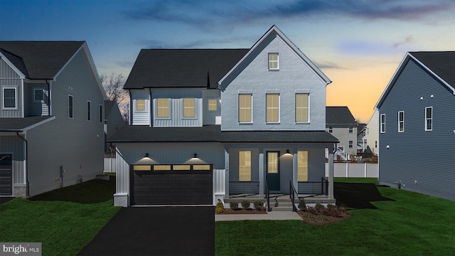 114 Heyford Dr, Stephenson, VA 22656 - view of front of house featuring a shingled roof, a garage, covered porch, and driveway