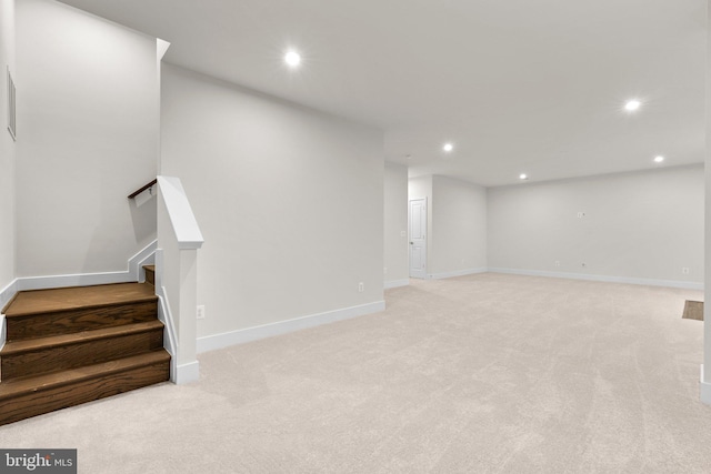 114 Heyford Dr, Stephenson, VA 22656 - below grade area featuring light colored carpet, recessed lighting, stairs, and baseboards