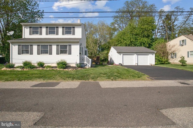 140 Grandview Ave, Hamilton, NJ 08620 - traditional-style home with an outdoor structure, a detached garage, a front lawn, and a chimney