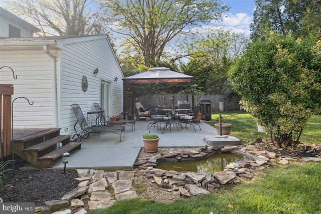 140 Grandview Ave, Hamilton, NJ 08620 - view of patio with a gazebo and a small pond