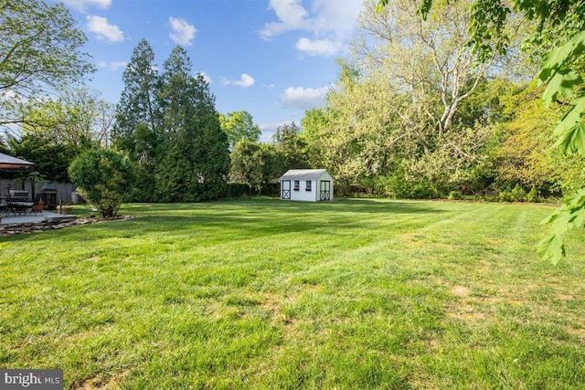140 Grandview Ave, Hamilton, NJ 08620 - view of grassy yard featuring a storage unit, an outdoor structure, a patio area, and a gazebo